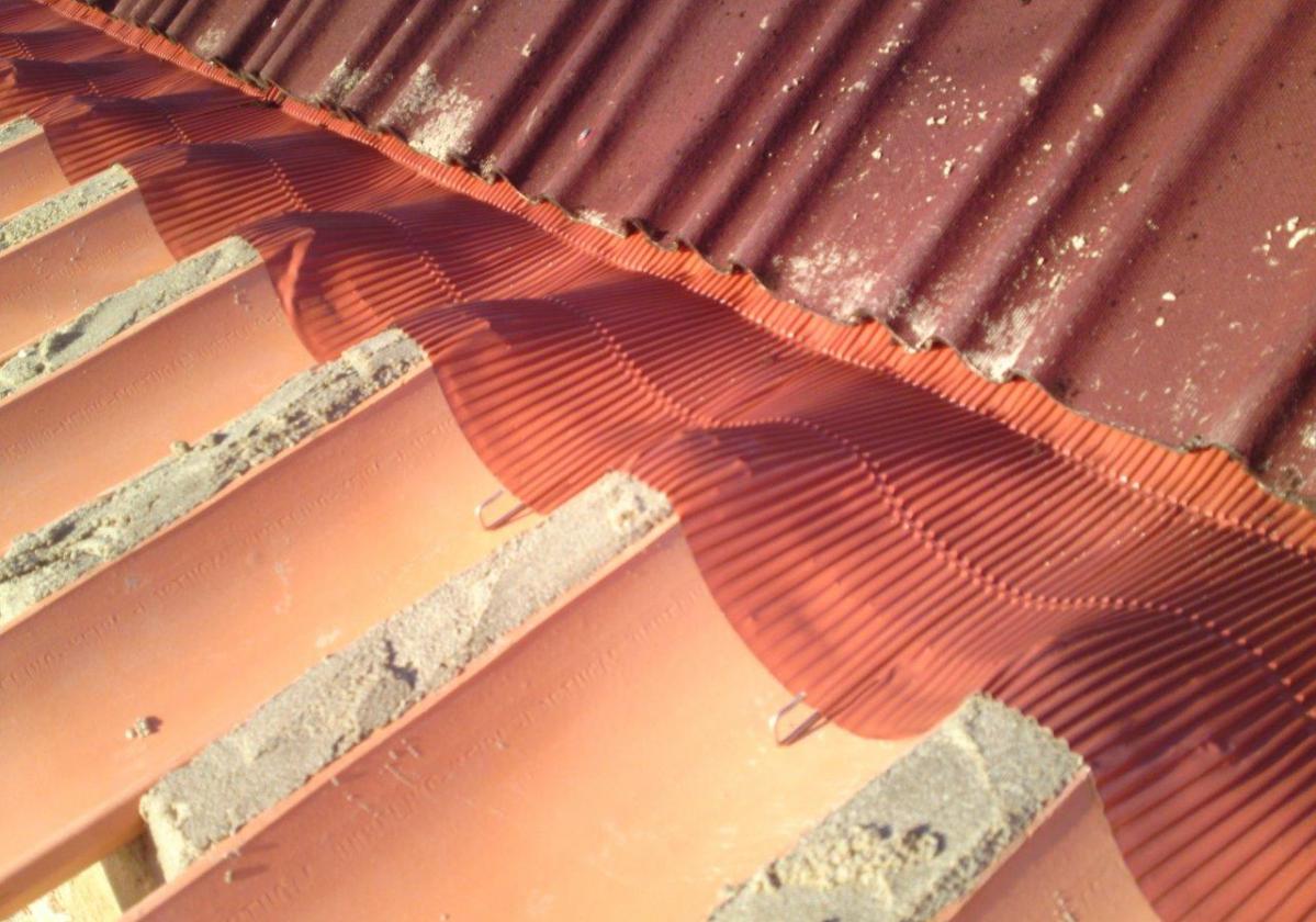 Cinta metálica impermeable sellado cubierta METALFILM - Impermeabilización Tejado detalle alero teja curva