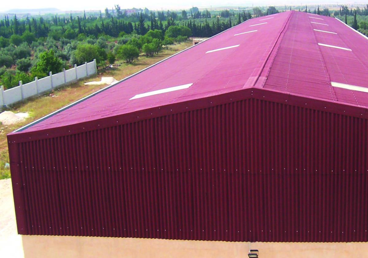 Cumbrera placa asfáltica ondulada impermeabilización cubierta ONDUCOBER - detalle remate cumbrera edificio industrial